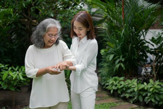 old-elderly-asian-woman-walking-backyard-with-her-daughter-concept-happy.jpg